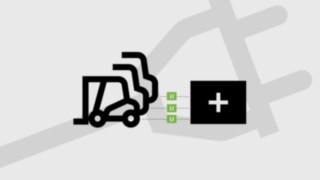 Abbildung von mehreren Flurförderzeugen an einer Ladestation Linde Flurförderzeuge an einer Ladestation